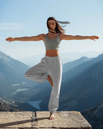 Mountain Peak Sweatpants Mockup Yoga Pose On Cliff With Scenic Valley View Morning Light