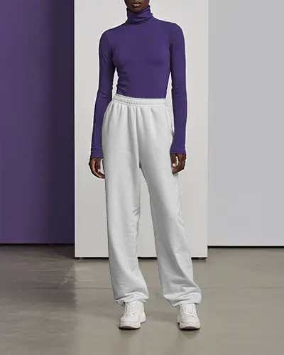 Modern Studio Sweatpants Mockup Elegant Figure In Purple Turtleneck Against Minimal Backdrop