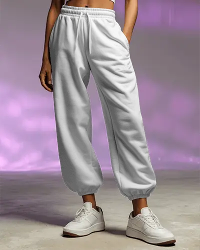 female-model-wearing-sweatpant-mockup-in-studio-with-purple-light-background-and-sneakers