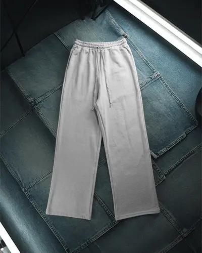 flatlay-sweatpants-mockup-on-denim-patchwork-surface-stylish-streetwear-display-modern-look