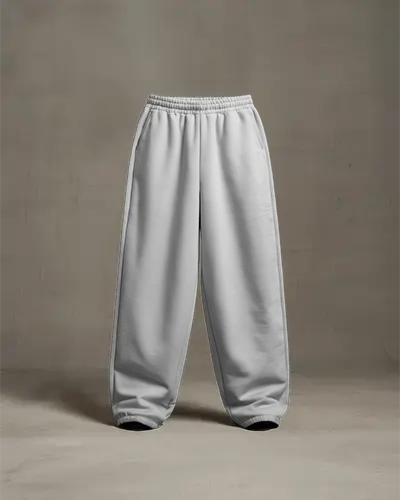 minimal-gallery-sweatpants-mockup-on-seamless-beige-wall-clean-cinematic-luxury-editorial