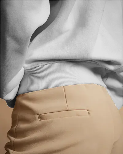 Stylish Backview Sweatshirt Mockup Female Model In Beige Trousers Closeup On Fabric Details Soft Lighting Modern Minimalist Look