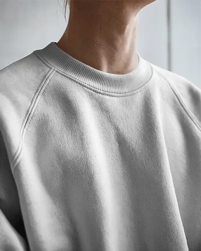 Bright Closeup Sweatshirt Mockup Female Model Neck And Shoulder Focus Natural Light High Detail On Fabric And Stitching Clean Modern Style