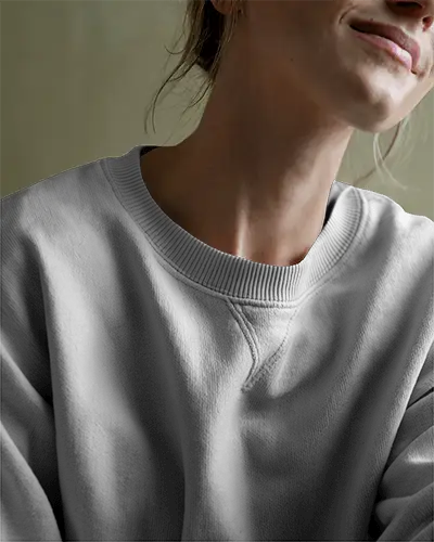 Soft Closeup Sweatshirt Mockup Female Model Smiling Natural Light Warm Ambience Focus On Collar And Fabric Texture Relaxed And Cozy Vibe