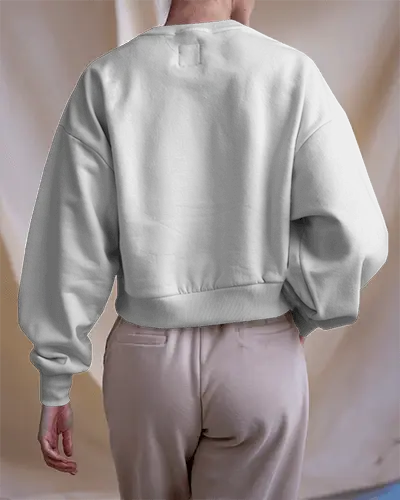 Photorealistic White Crewneck Sweatshirt Mockup Showing Relaxed Fit And Texture