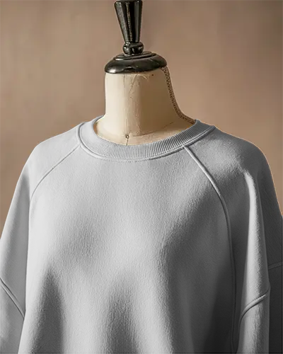 white-sweatshirt-mockup-on-mannequin-closeup-front-view-soft-lighting-neutral-background-design-showcase-template
