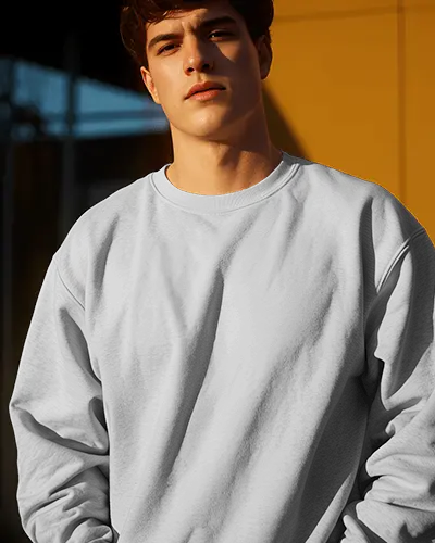 serious-male-model-sweatshirt-mockup-standing-against-yellow-wall-in-hard-sunset-lighting