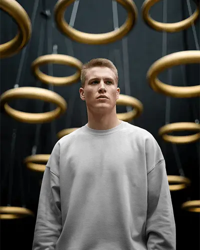 Golden Rings Modern Studio Sweatshirt Mockup Male Model In Minimal Urban Setting