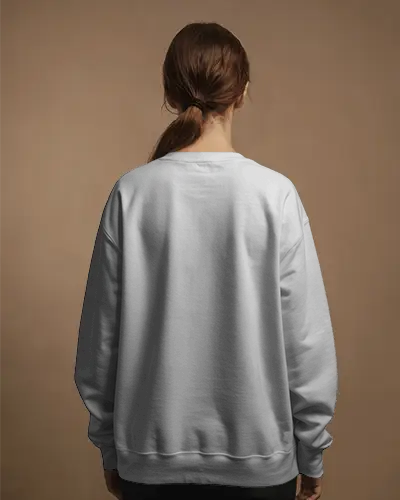 Cozy Back Look Sweatshirt Mockup Woman Standing In Studio With Neutral Brown Background