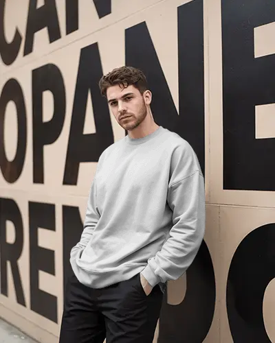 Urban Streetwear Sweatshirt Mockup Male Model Posing Against Bold Typography Wall Backdrop