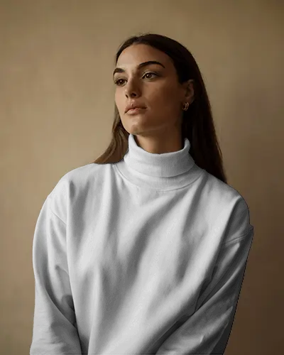 Minimalist Sweatshirt Mockup Female Model In Soft Lighting With High Neck Casual And Refined Style