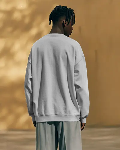 Back View Sweatshirt Mockup Male Model In Light Trousers Outdoor Sunny Setting