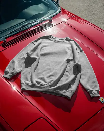 Vintage Red Car Sweatshirt Mockup Streetwear Style Bold Contrast Urban Fashion Display