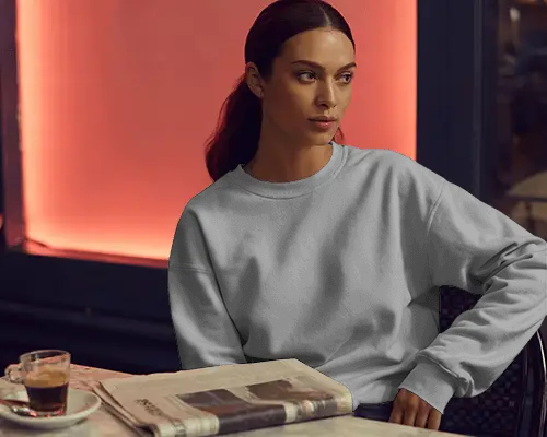 Cozy Cafe Sweatshirt Mockup Woman With Coffee Newspaper Warm Evening Light Fashion Look