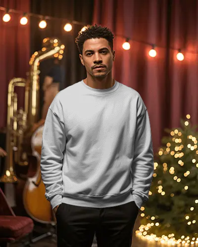 Christmas Sweatshirt Mockup Male Model In Festive Music Room With String Lights And Holiday Tree