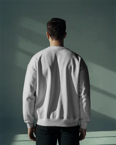 Sweatshirt Mockup Back View Male Model In Minimal Studio With Soft Directional Daylight