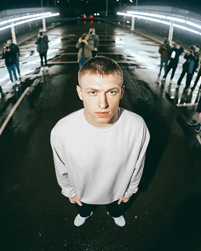 Sweatshirt Mockup Top Down Male Model In Urban Parking Lot With Night Lighting And Street Style