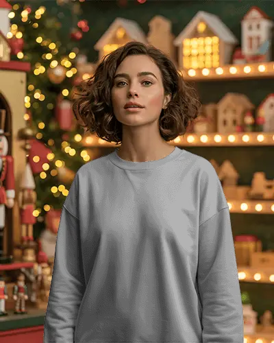 Christmas Sweatshirt Mockup Woman Standing In Festive Holiday Village Scene With Warm Lights