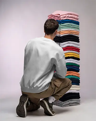 Trendy Casual Sweatshirt Mockup For Men Showcasing Variety Of Folded Apparel Stacks