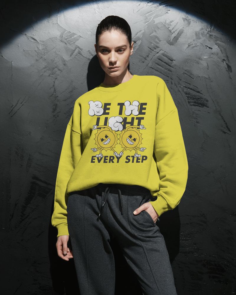 Textured Wall Sweatshirt Mockup Female Model Leaning In Soft Shadowed Lighting