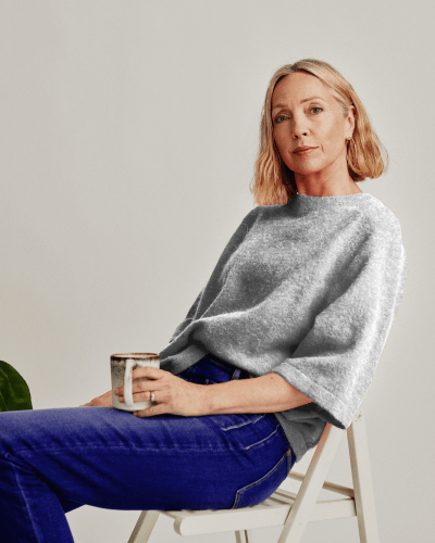 Gemini Themed Knitwear Mockup On Seated Model