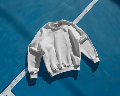 Sweatshirt Mockup Lying On Blue Court