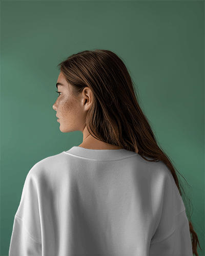 Sweatshirt Mockup On A Female Model With Green Studio Screen Scene1
