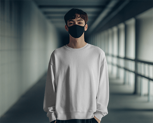 Front View Sweatshirt Mockup With Masked Male Model In Modern Hallway Setting
