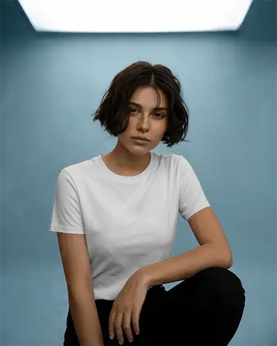 Casual Fashion T Shirt Template Mockup Short Haired Female Model Looking Forward In Moody Lighting