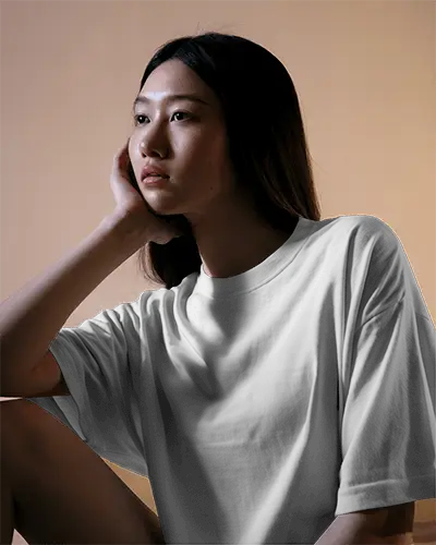 Oversized White Shirt Mockup With Modern Soft Shadow Effect On Serene Young Woman