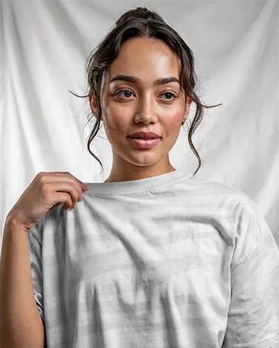 Plain Front Tshirt Design Mockup On Model Holding Fabric To Showcase Logo Placement Area