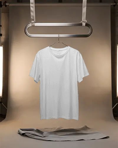 plain-crew-neck-tshirt-hanging-on-modern-clothes-rack-in-studio-setting