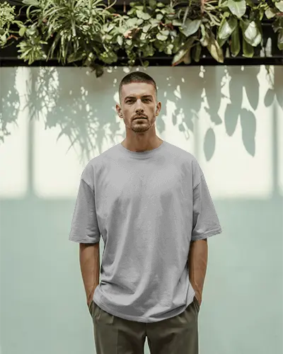 male-model-wearing-minimalist-plain-tshirt-mockup-for-clothing-brand-advertising