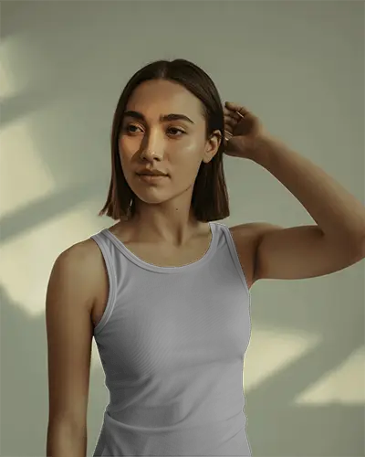 indoor-sunlight-tank-top-mockup-model-wearing-fitted-top-with-evening-glow-in-minimal-studio-scene