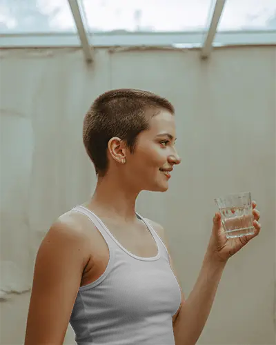 female-model-wearing-stylish-tank-top-mockup-for-athletic-and-casual-outfit-promotion