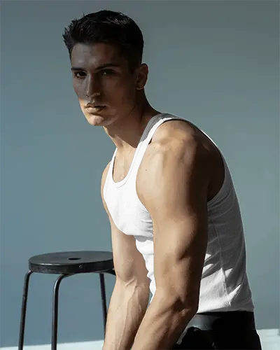 Muscled Athlete Wearing Plain Ribbed Tank Top Mockup Sweat Proof Athletic Apparel For Men