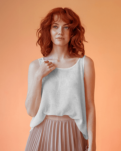 Woman With Curly Hair In Mustard Tanktop Mockup Under Peach Tones With An Inspiring Quote