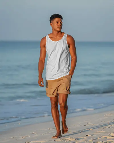 beachside-morning-tank-top-mockup-male-model-walking-calmly-on-sandy-shore