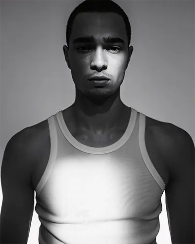 Male Model Wearing Sporty Tank Top Mockup Photography For Summer Outfit Promotion