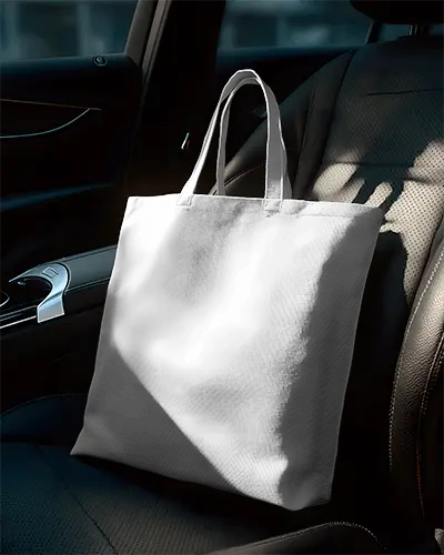 premium-fabric-tote-bag-mockup-in-car-seat-setting-for-branding-showcase