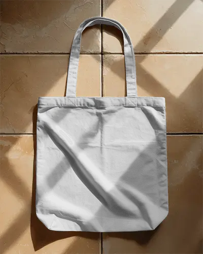 Tote Bag Mockup On Tiled Floor Soft Sunlight Shadow Casual Scene Relaxed Summer Vibe Composition