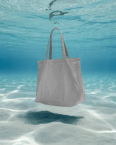 High Resolution Tote Bag Mockup With Natural Lighting Floating In Clear Water Background