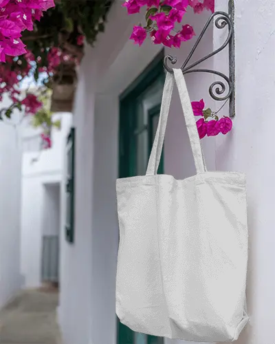 Sustainable Canvas Tote Bag Mockup For Custom Designs On Citysidewalk Hanging Display