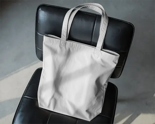 High Quality Blank Tote Bag Mockup On Minimalist Leather Chair Background 0304