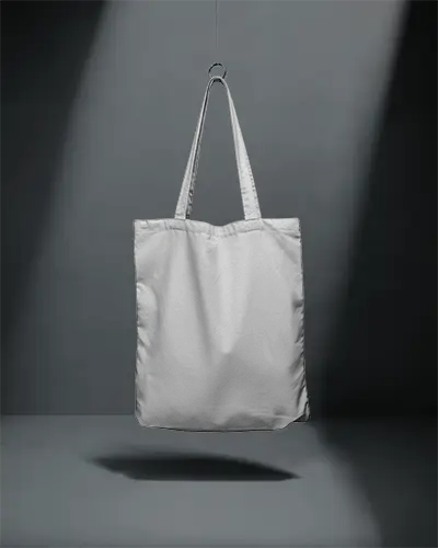 Hanging Cotton Tote Bag Mockup With Long Handles In Studio Background For Product Presentation