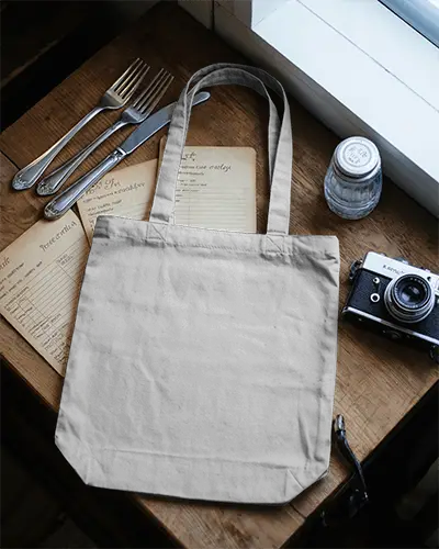 Eco Friendly Customizable Tote Bag Mockup Placed On Wood Texture Surface For Design Preview 0332