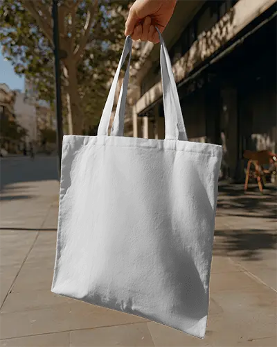 durable-plain-tote-bag-mockup-hanging-in-urban-setting-for-brand-logo-showcasing-use