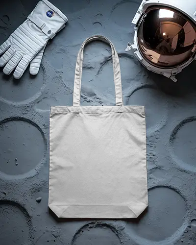 Moon Surface Tote Bag Mockup With Nasa Gloves And Helmet Space Themed Futuristic Design Showcase