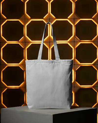 Tote Bag Mockup On Podium With Geometric Orange Backlit Wall Background