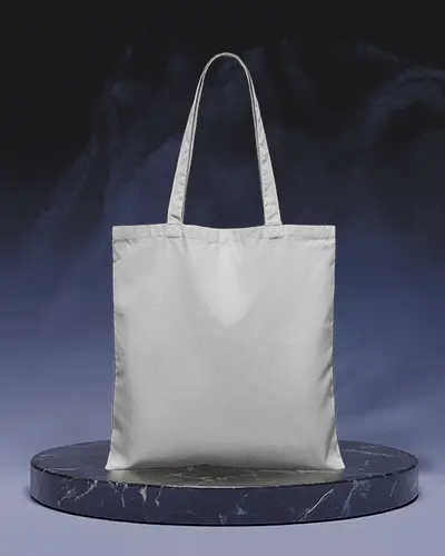 tote-bag-mockup-on-round-marble-platform-with-dark-blue-gradient-background